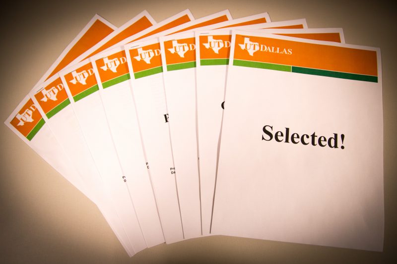 Papers that read "Selected"