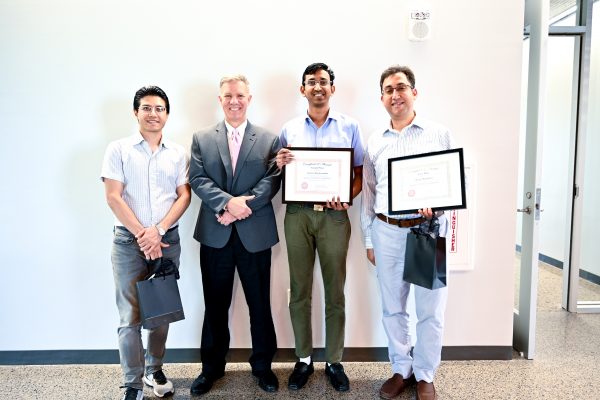 Dr. Pancrazio with the top 3 Spring 2019 poster competition winners. 