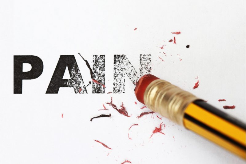Eraser erasing the word "Pain"